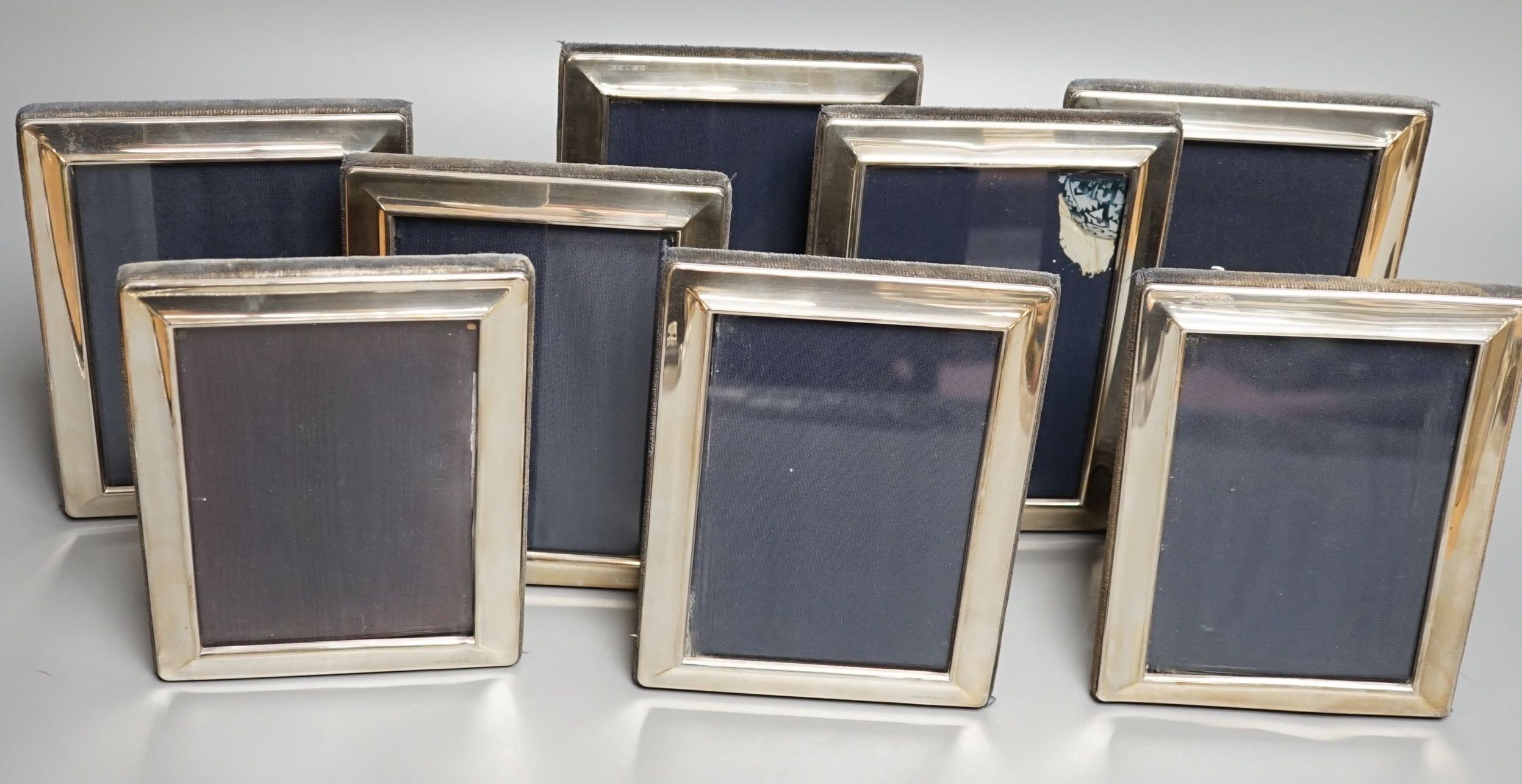 A set of eight modern silver mounted rectangular photograph frames, Carrs of Sheffield, 2001, 18cm.